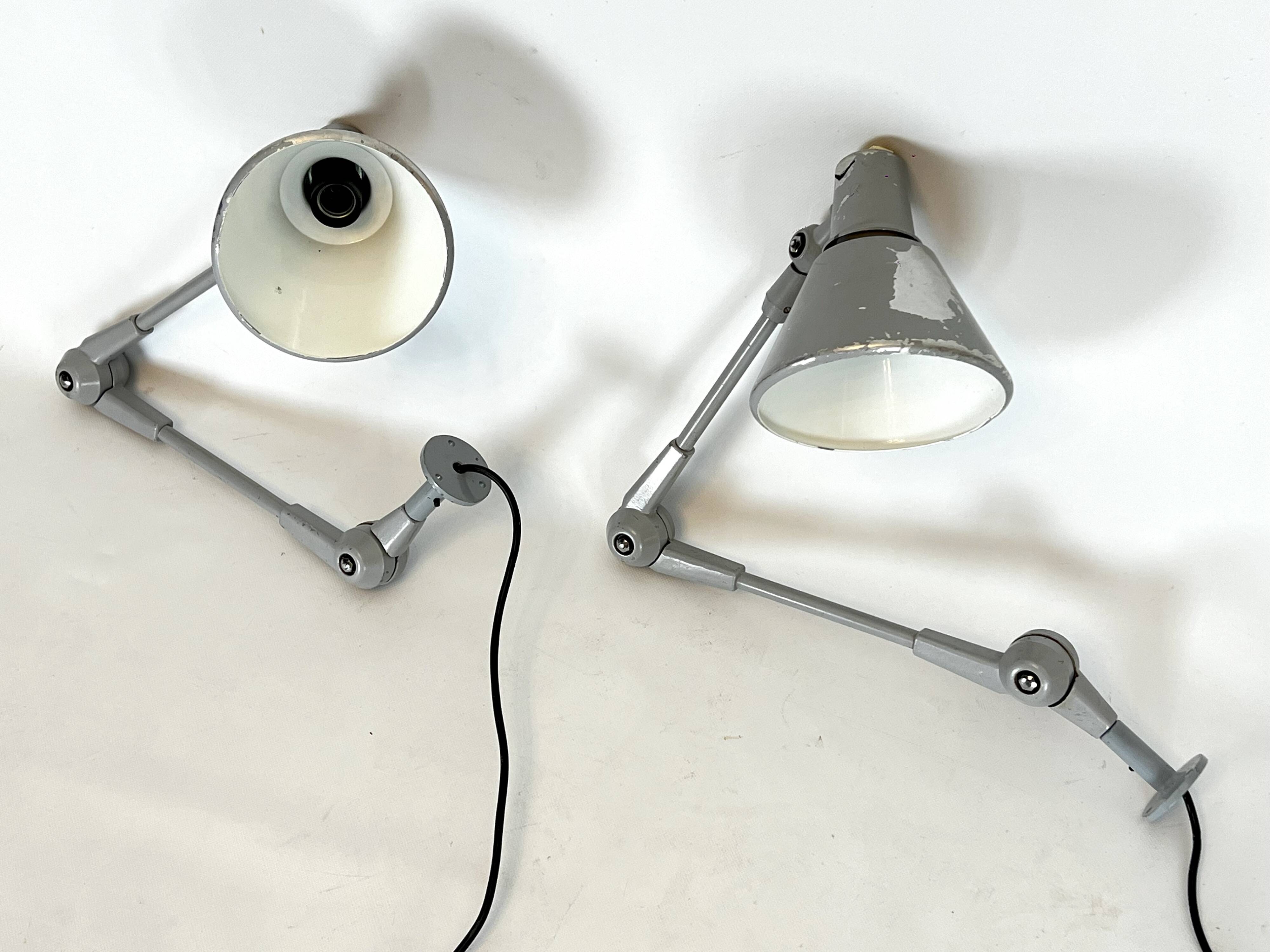 Mid-Century AURE set of two rare wall lamps in metal. Italy 1960s