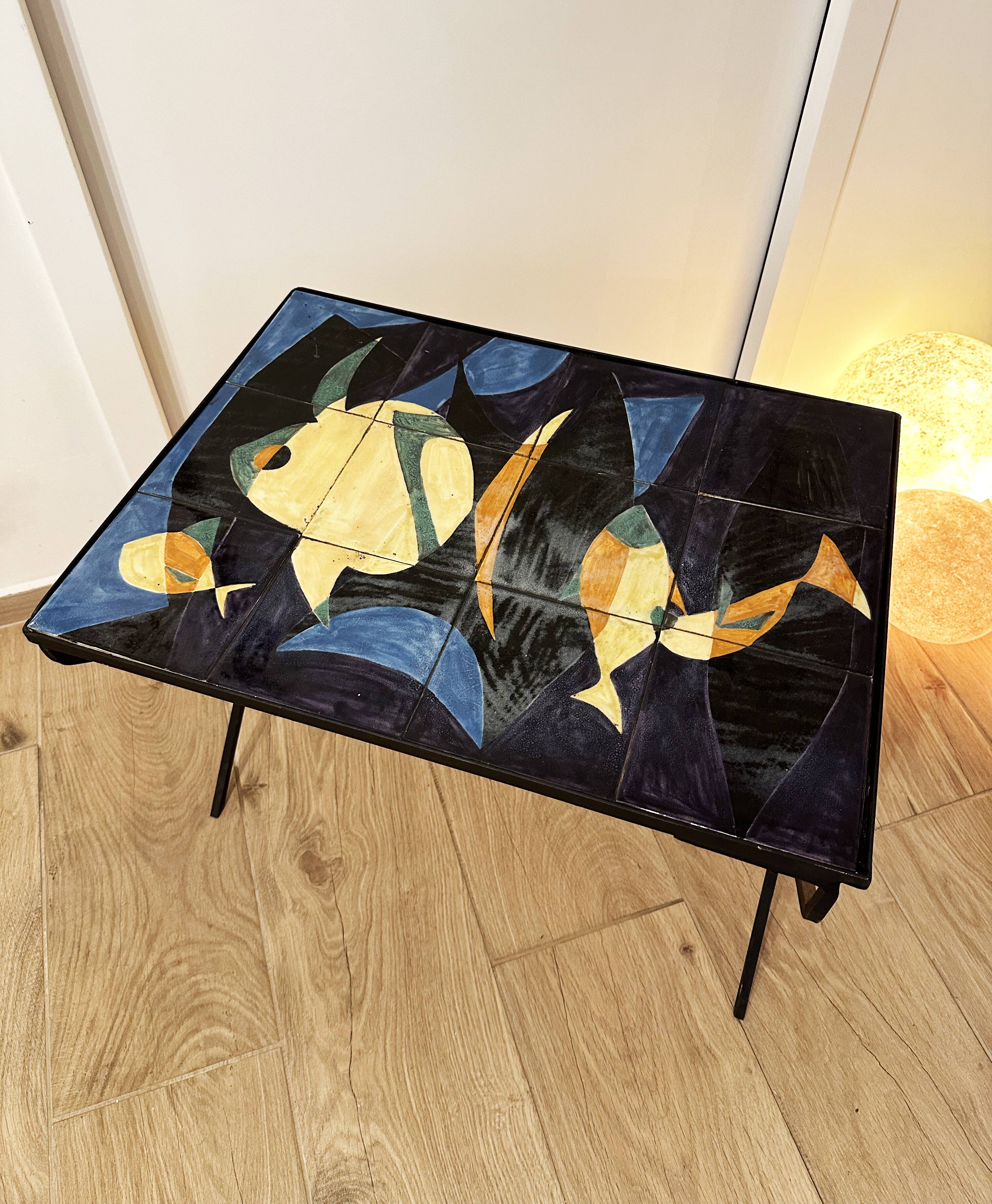 Coffee table with hand-painted ceramic top. France, 1950s