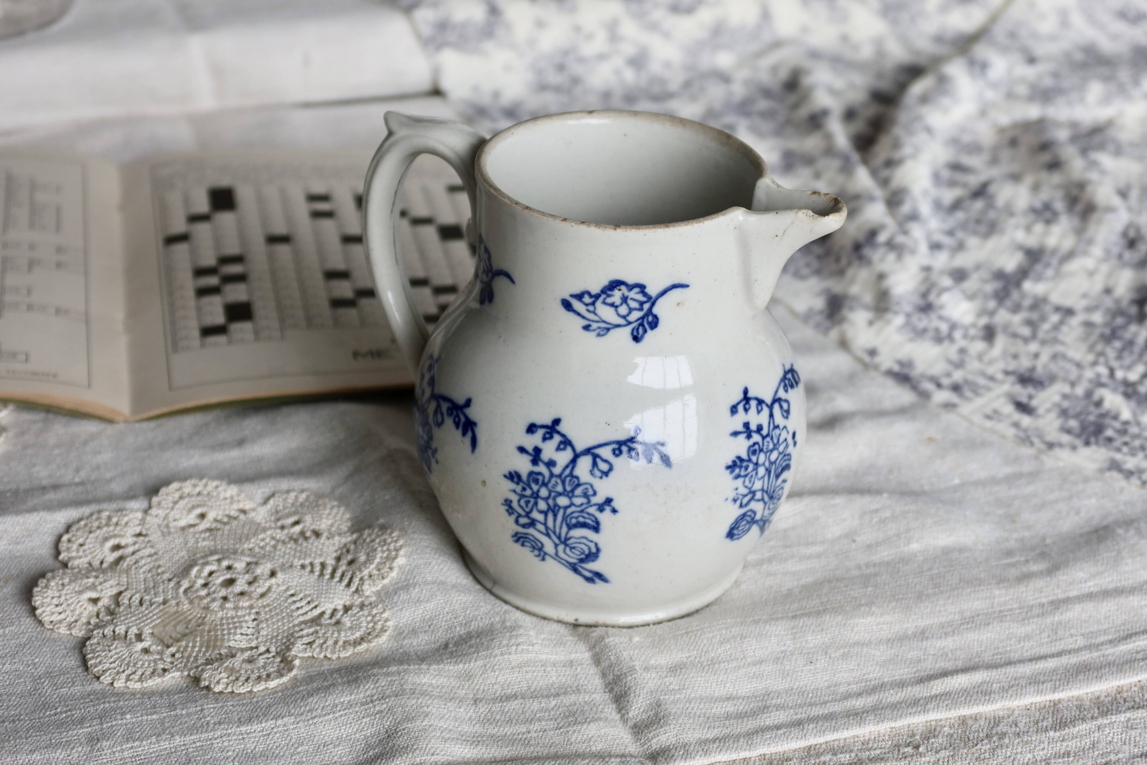 Antique Saint-Uze steel clay pitcher with cobalt blue floral pattern