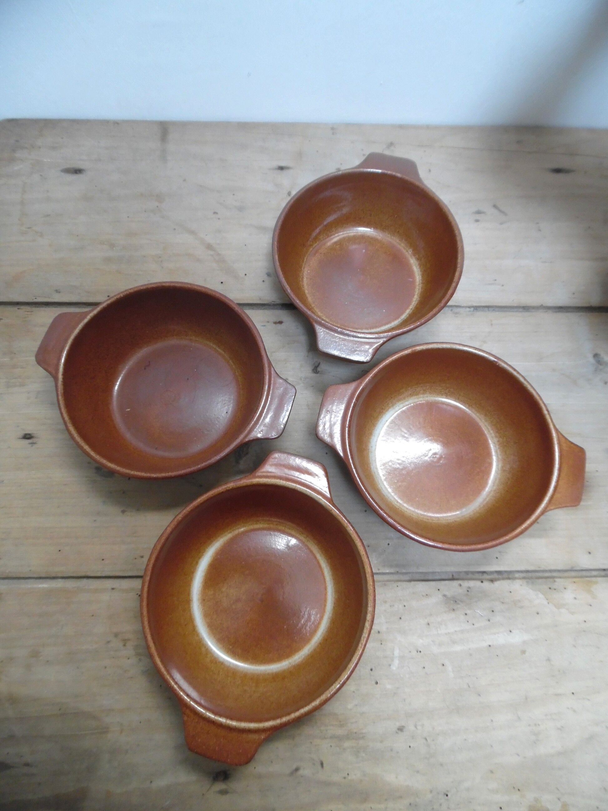 Set of soup plates to ears in sandstone