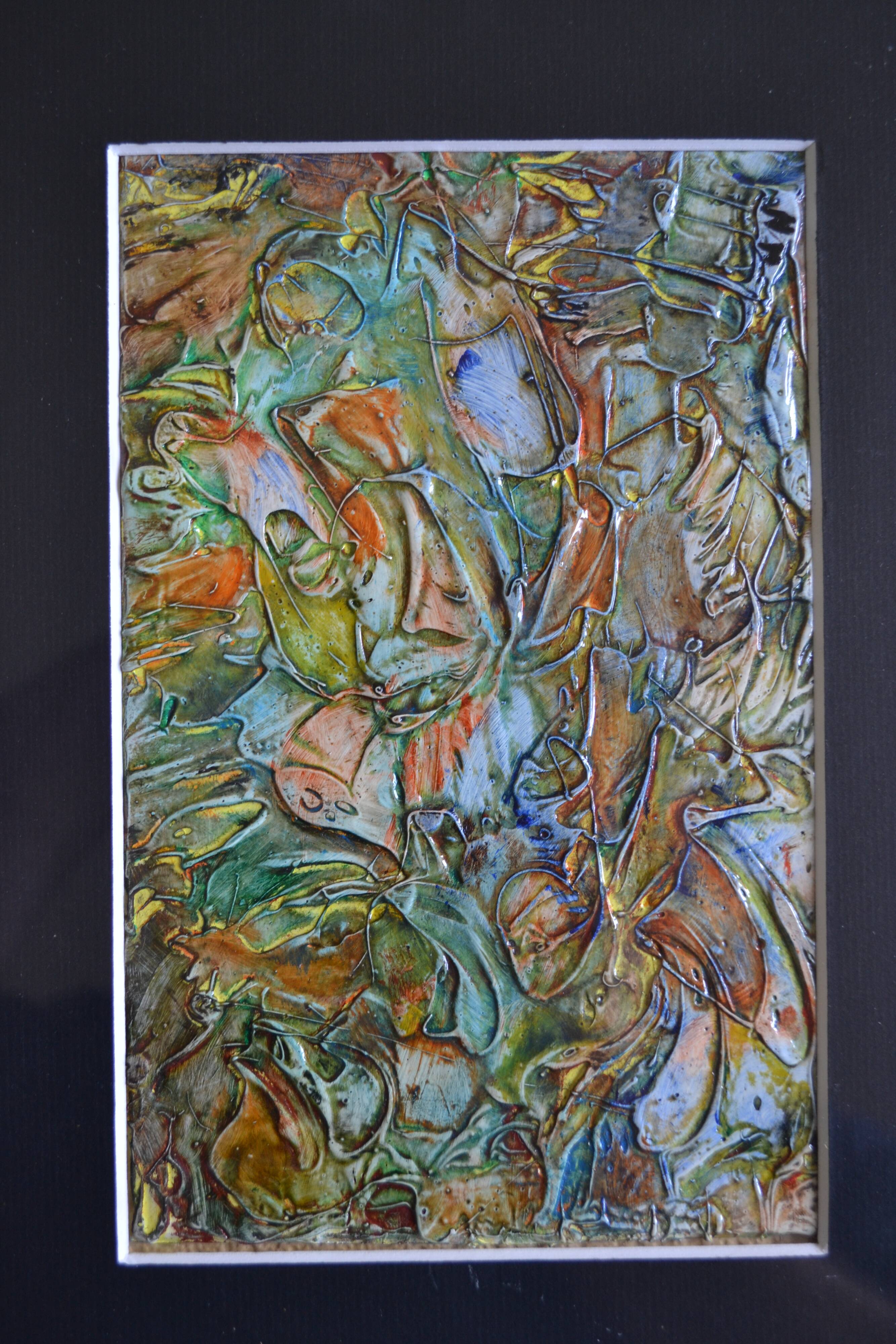 Framed abstract painting under glass