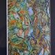 Framed abstract painting under glass