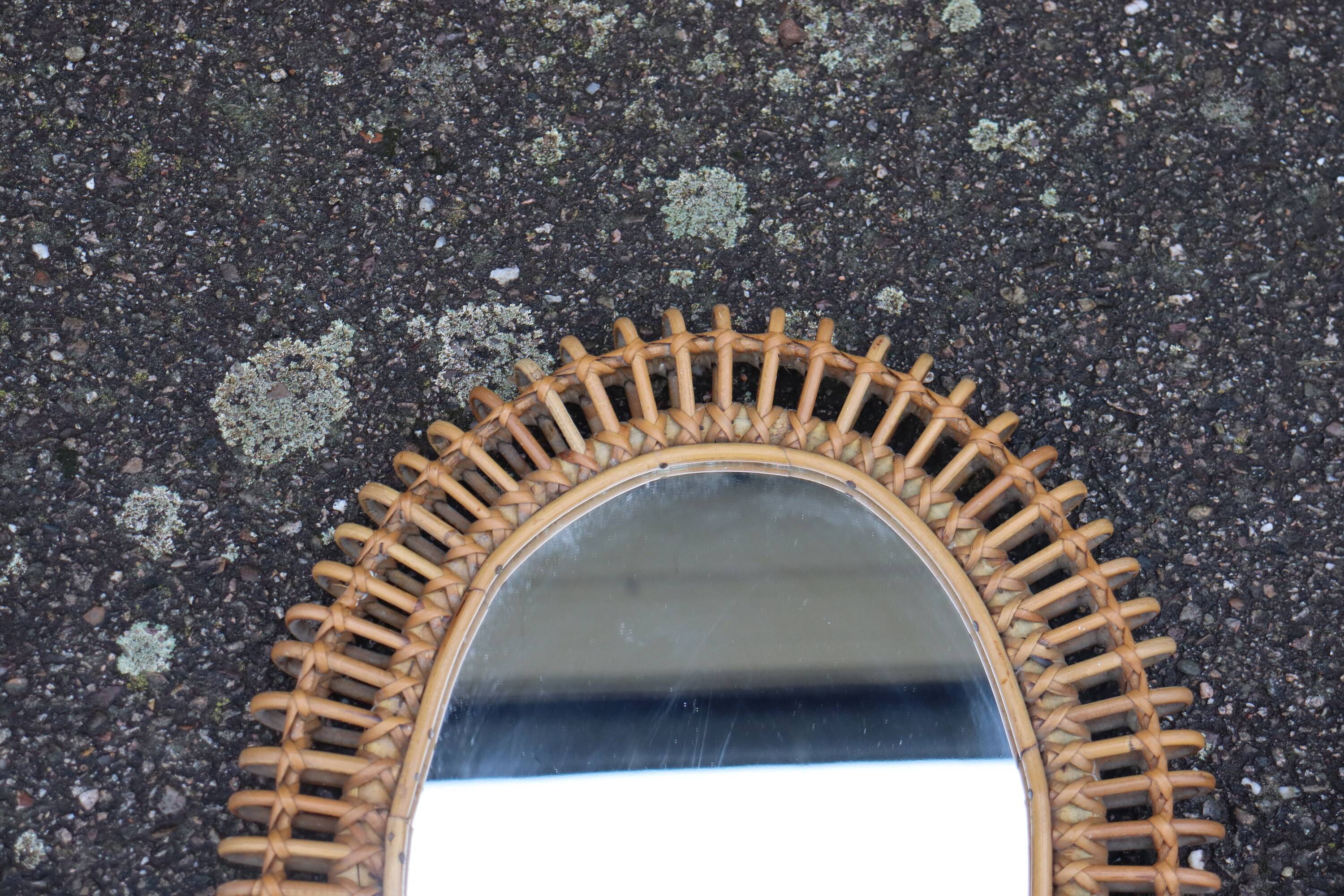 Pair of rattan mirrors attributed to Franco Albini, Italy 1950.