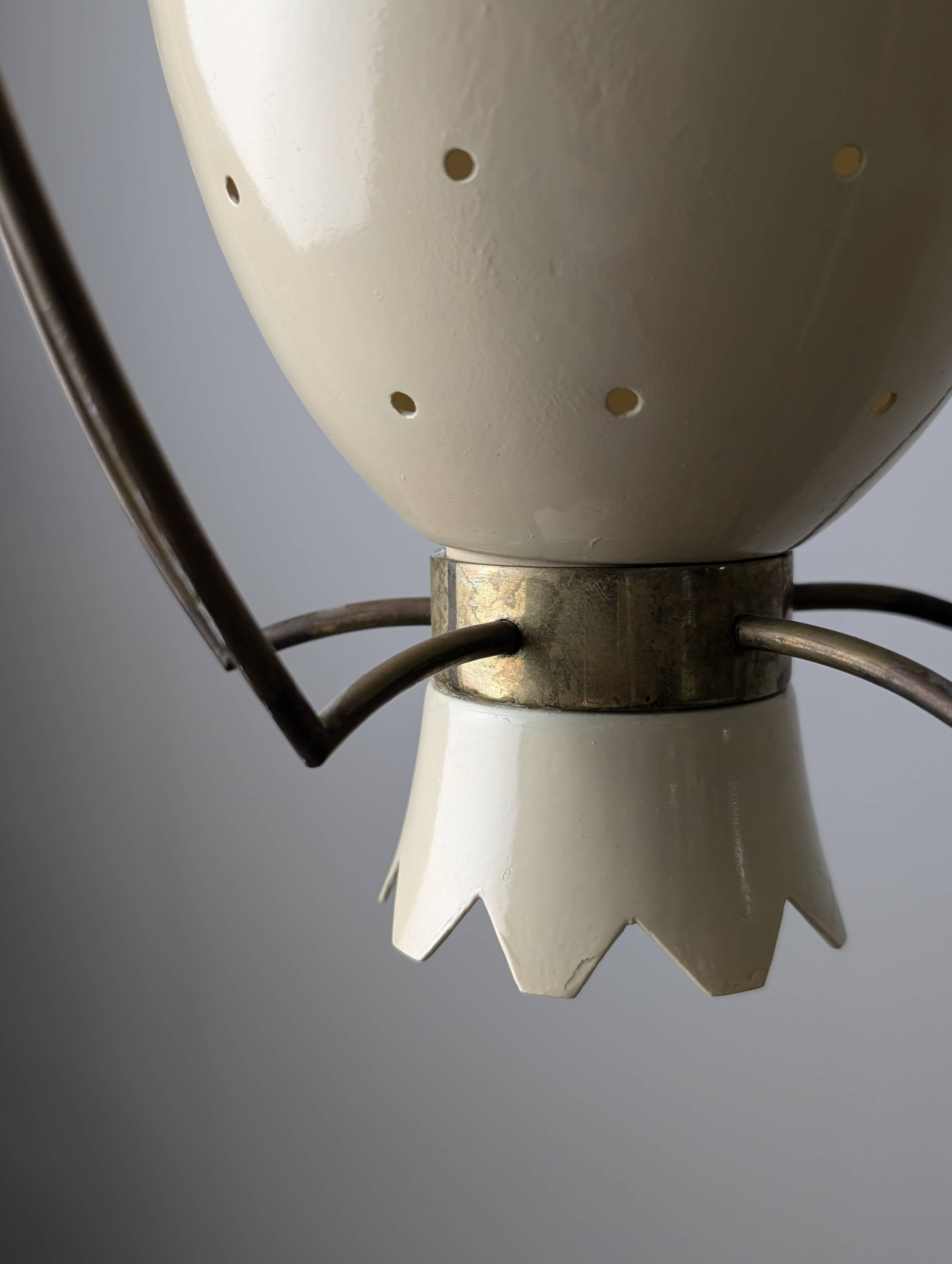 Perforated metal pendant lamp with brass details, Italy, 1940s