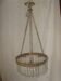 circular chandelier with a brass frame and crystal drops