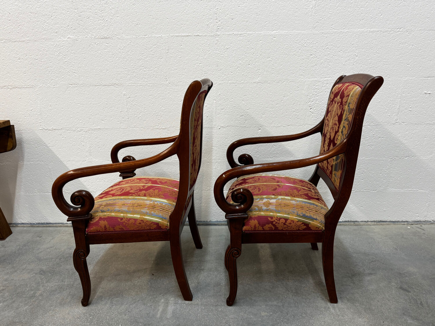 Pair of cross-back armchairs, Empire style, 19th century.
