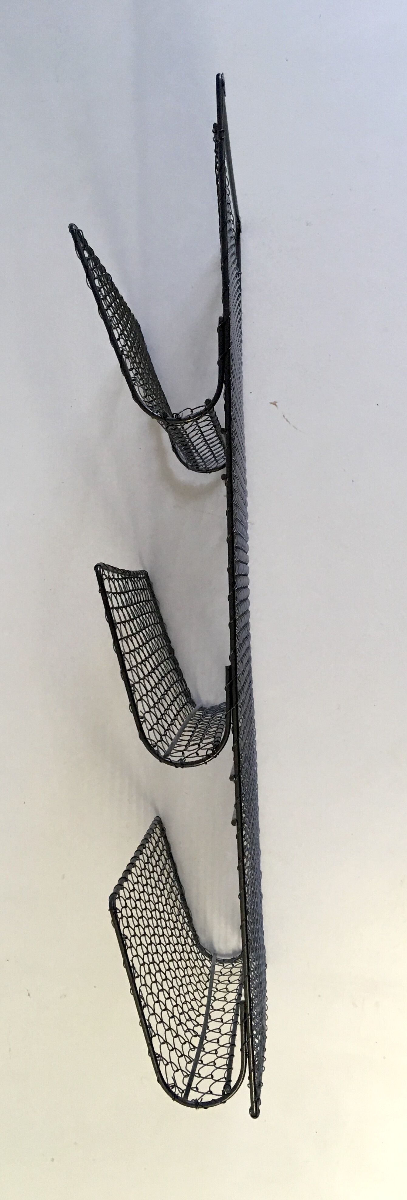 Industrial-style wall-review holders