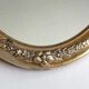 Golden oval mirror 86 x 42 cm