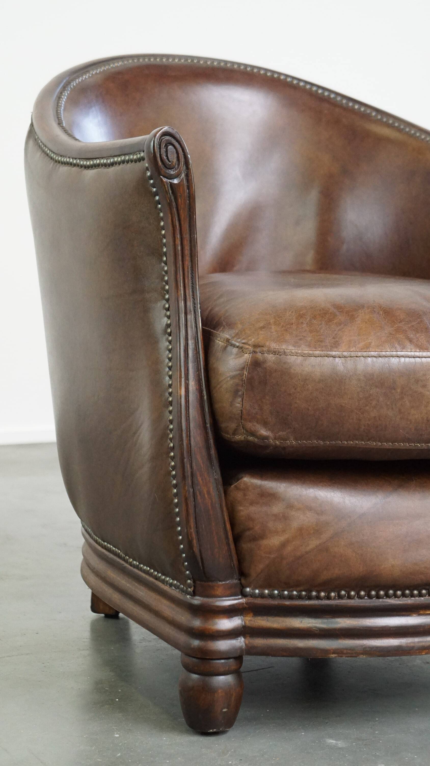 Set of 2 club chairs/armchairs in dark cognac leather