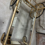 Vintage gold bar cart serving trolley