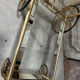 Vintage gold bar cart serving trolley