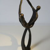 Tanned sculpture, "dancing couple". Signed M.N