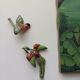 Two exotic birds in slip to hang