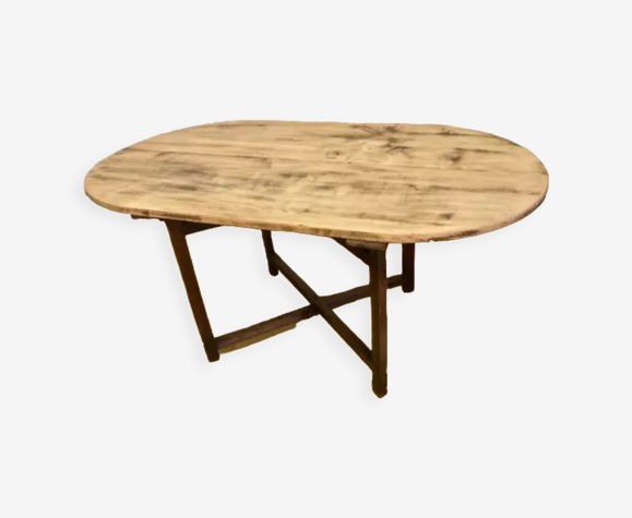 Table de festivité ovale en bois brut