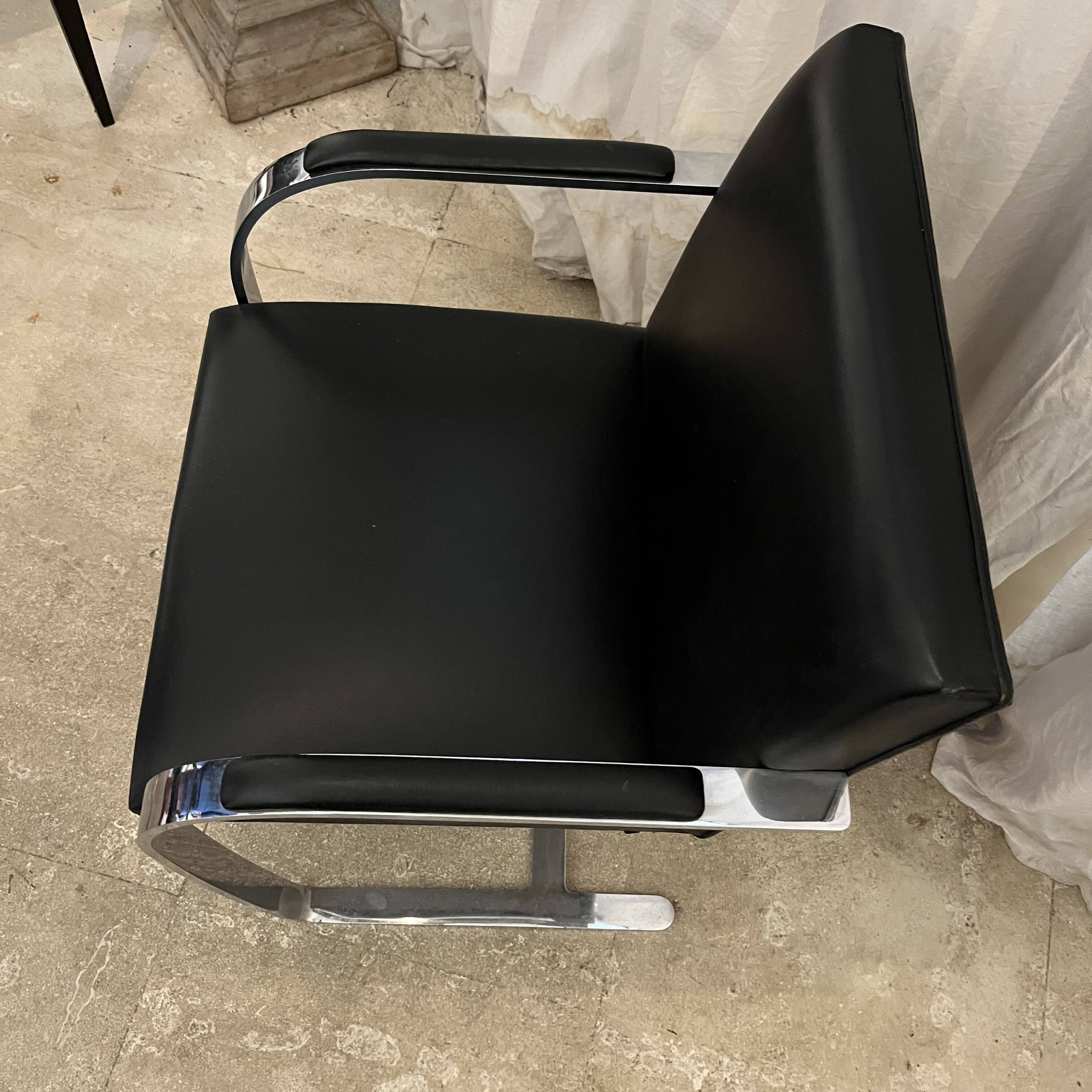 vintage flat steel armchair