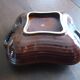 Square dish with brown and gold handles