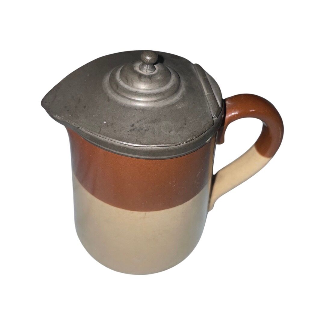 Small beige brown English earthenware milk jug