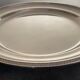 Round silver metal outline water leaf decoration, Félix Frères Goldsmith