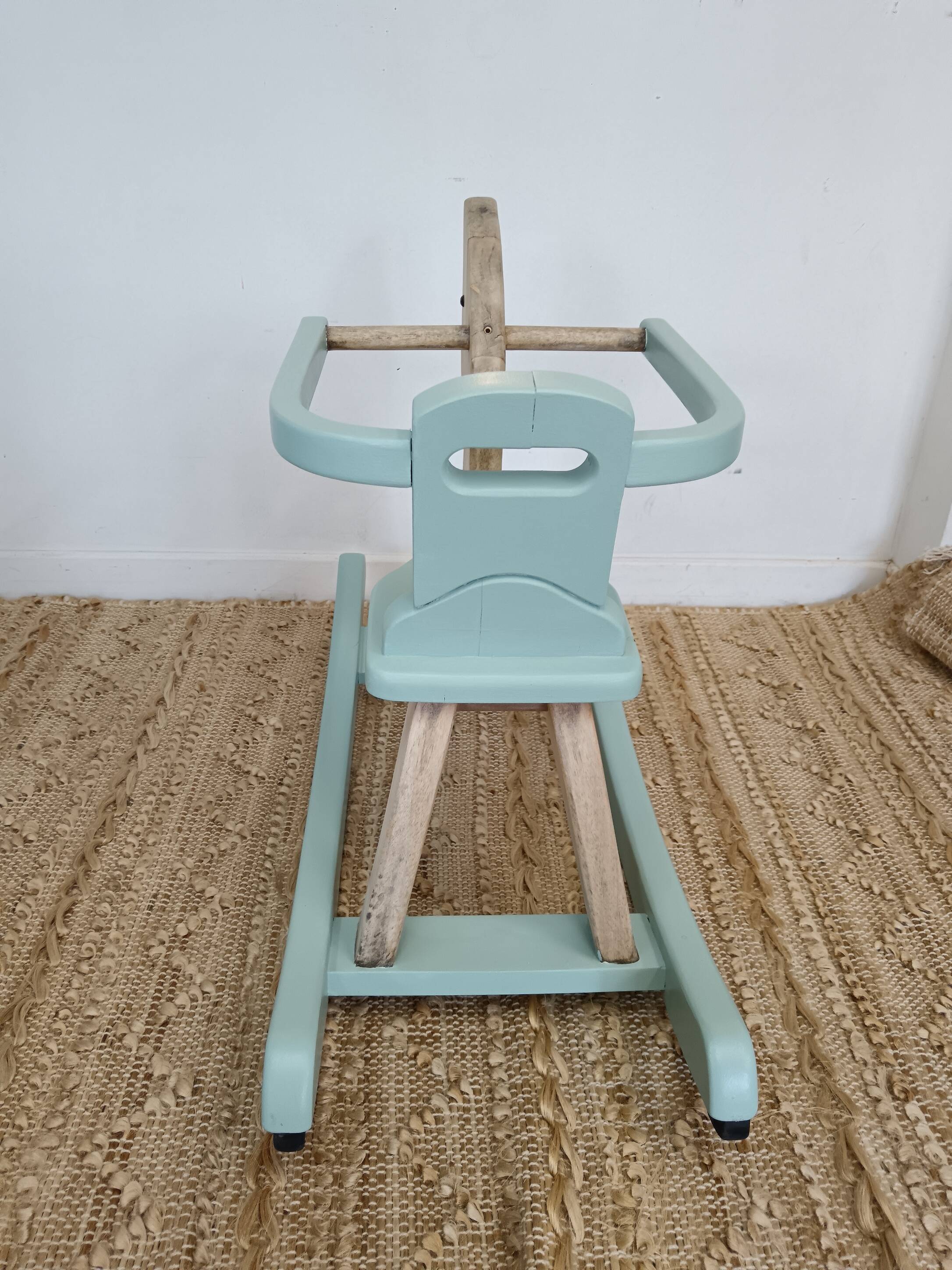 Wooden and celadon green rocking horse