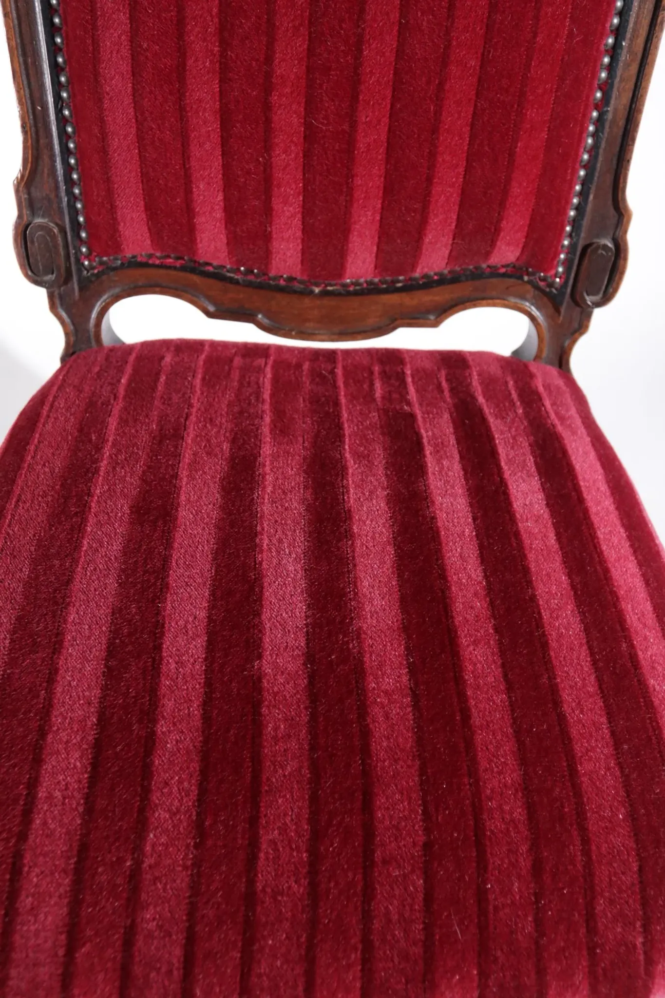 Nineteenth-century French carved chair with red velvet