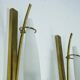 Set of three sconces in brass and triplex opaline glass. Italy 1950s