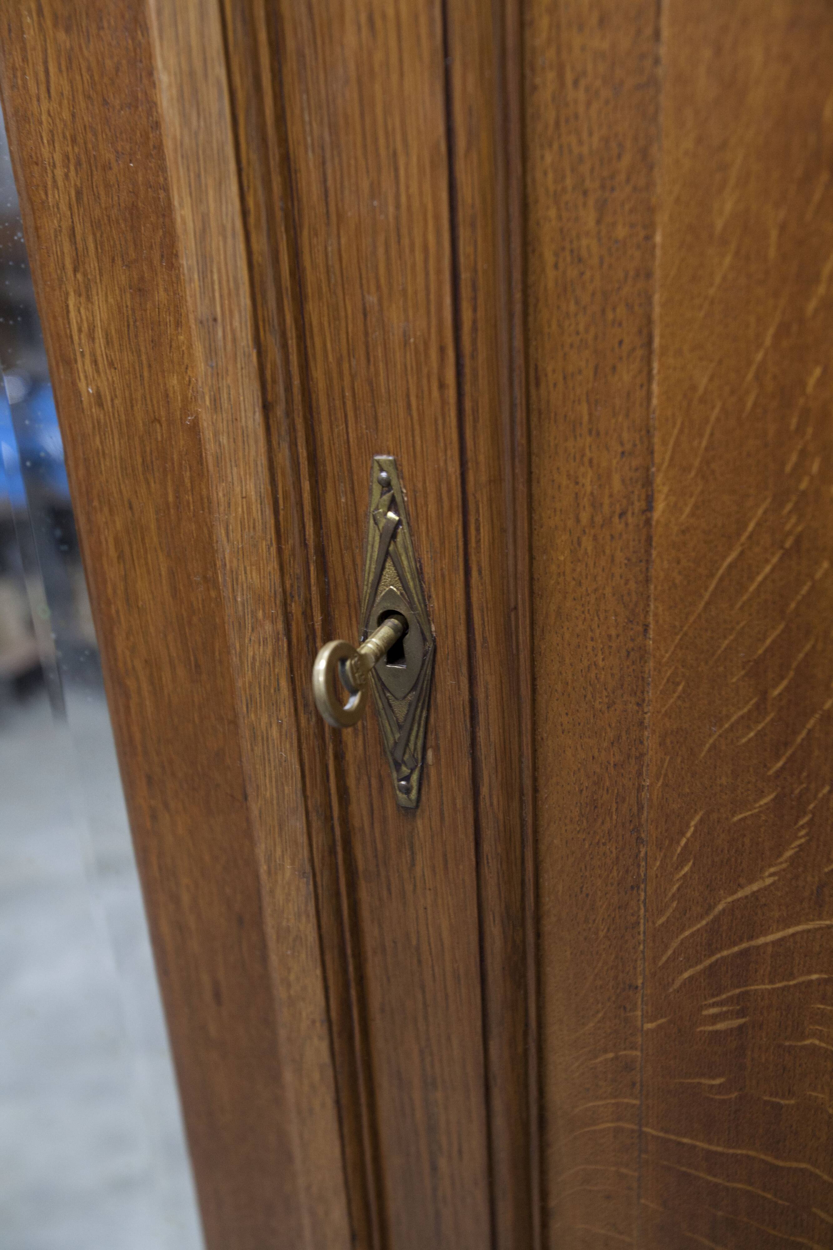 Art Deco oak sculpted wardrobe - Flemish workshop circa 1930