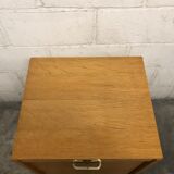 Vintage curtain-shaped binder in light honey-coloured oak