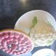 Glazed ceramic dessert dish with strawberry design.
