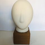 Ceramic head on wooden base