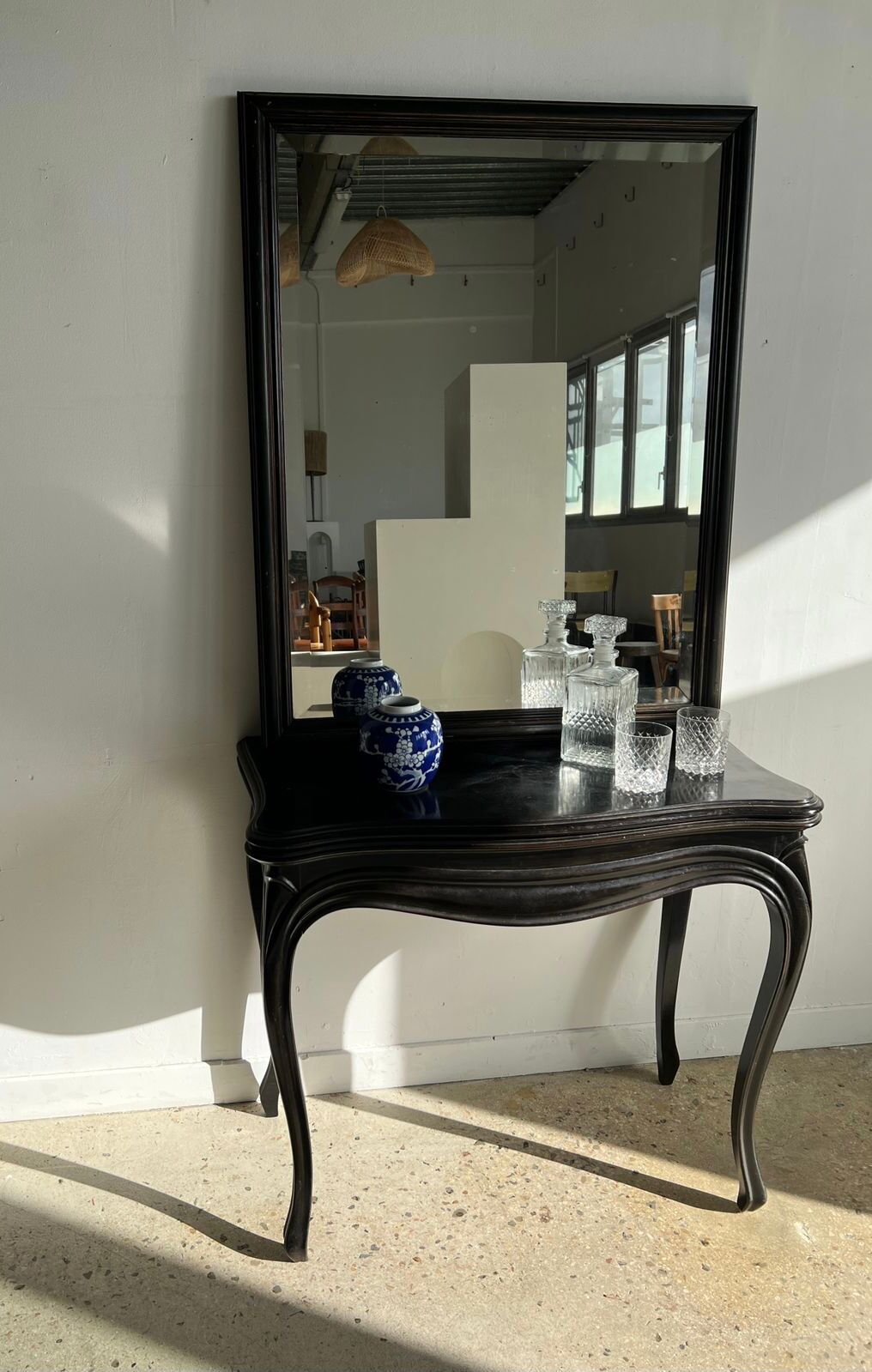 Rectangular mirror in molded blackened wood, beveled glass