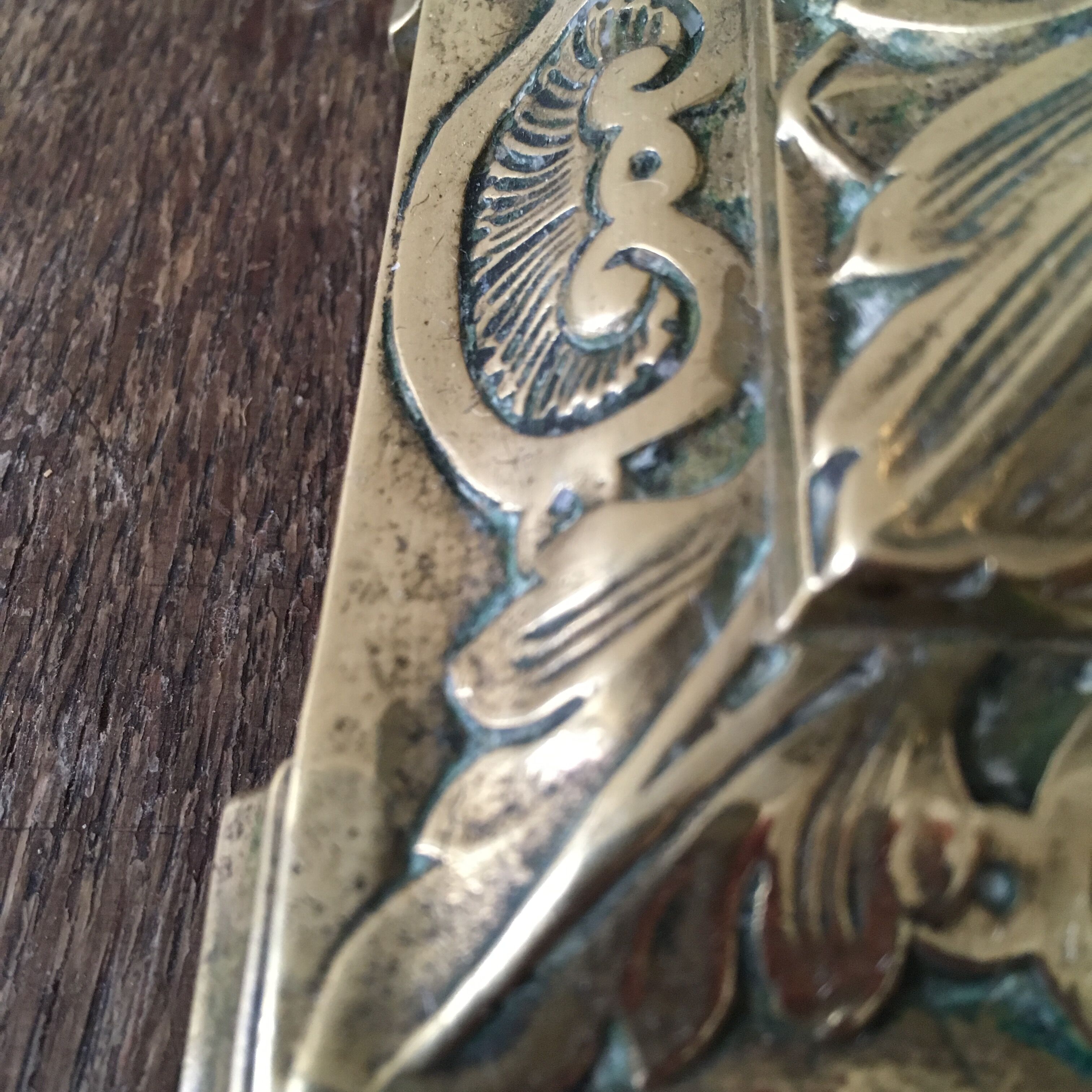 Old brass candle holder with square base