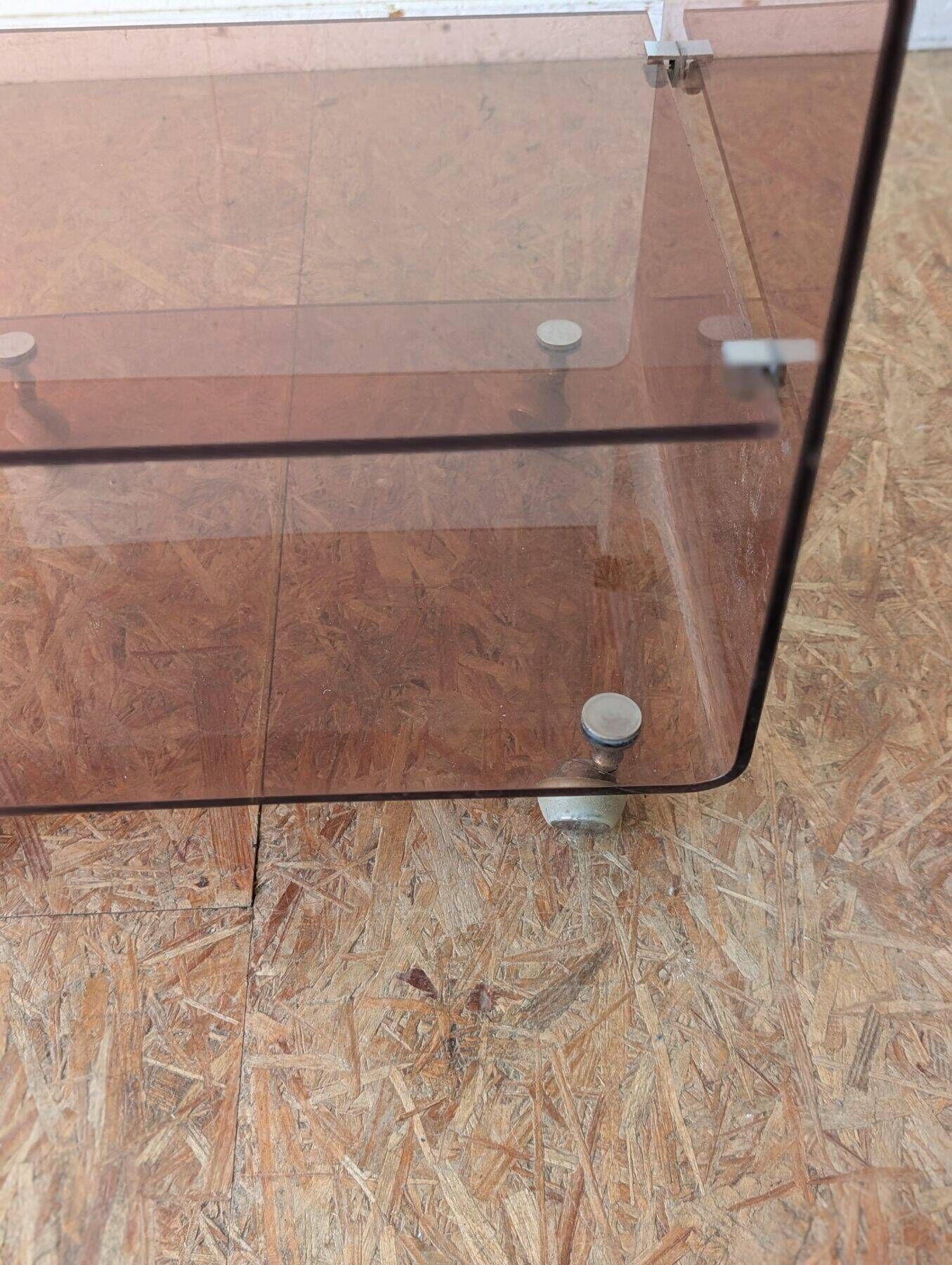 Pair of vintage smoked plexiglass bedside tables or accent furniture.