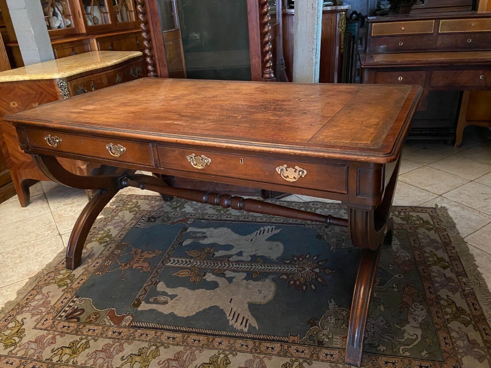 English mahogany desk early twentieth opening to two drawers