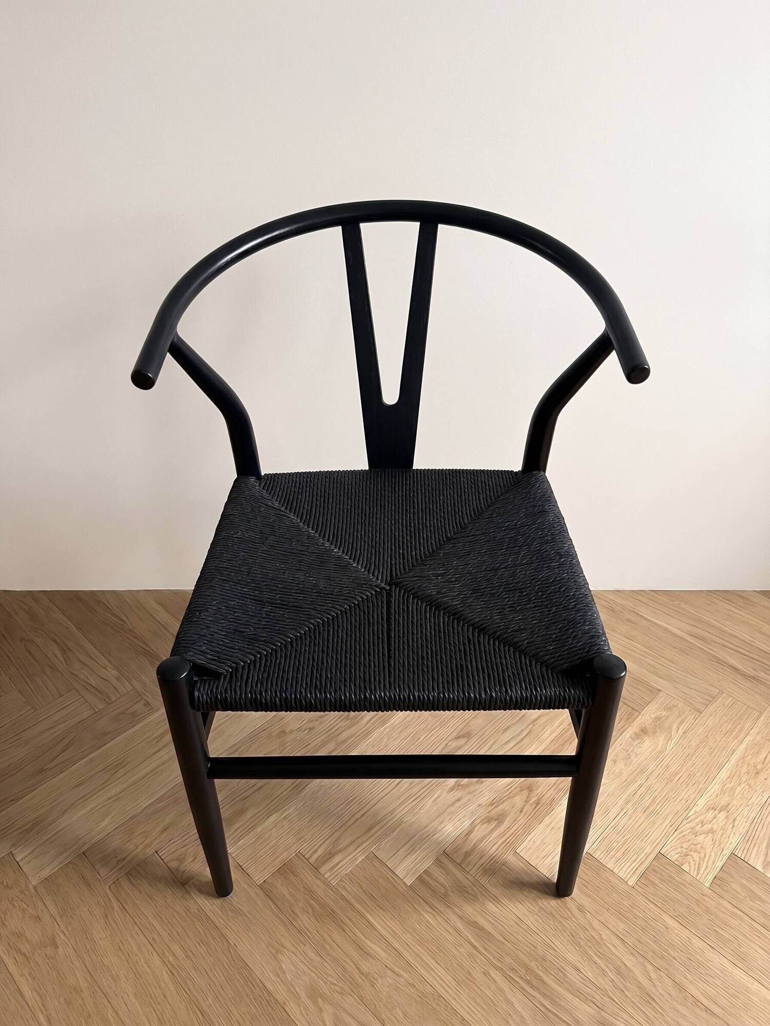 Set of 4 vintage Scandinavian Wishbone style chairs in black wood.