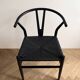 Set of 4 vintage Scandinavian Wishbone style chairs in black wood.