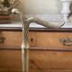 Antique repoussé brass umbrella stand