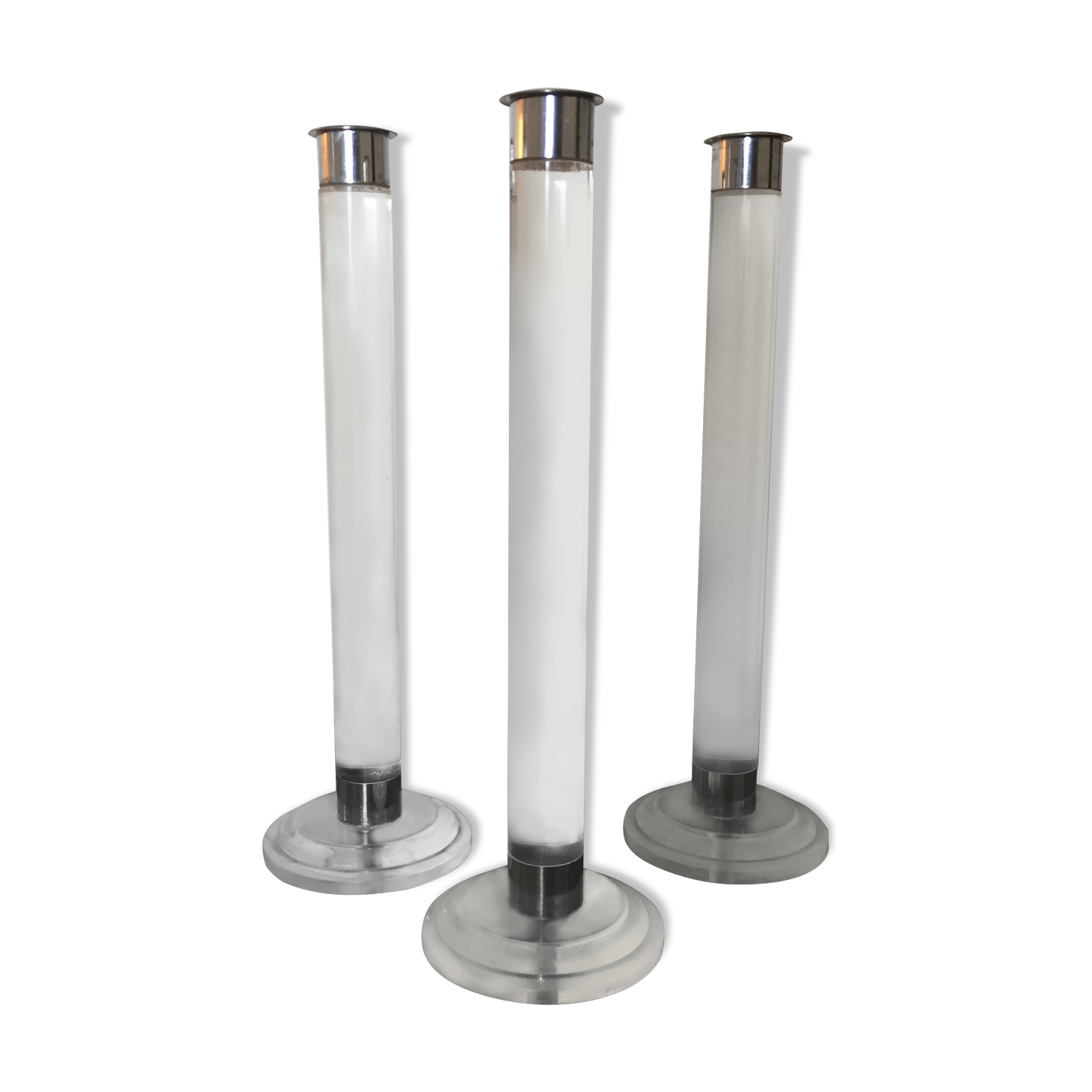 Serie of three candlesticks in Plexiglas and metal 1970