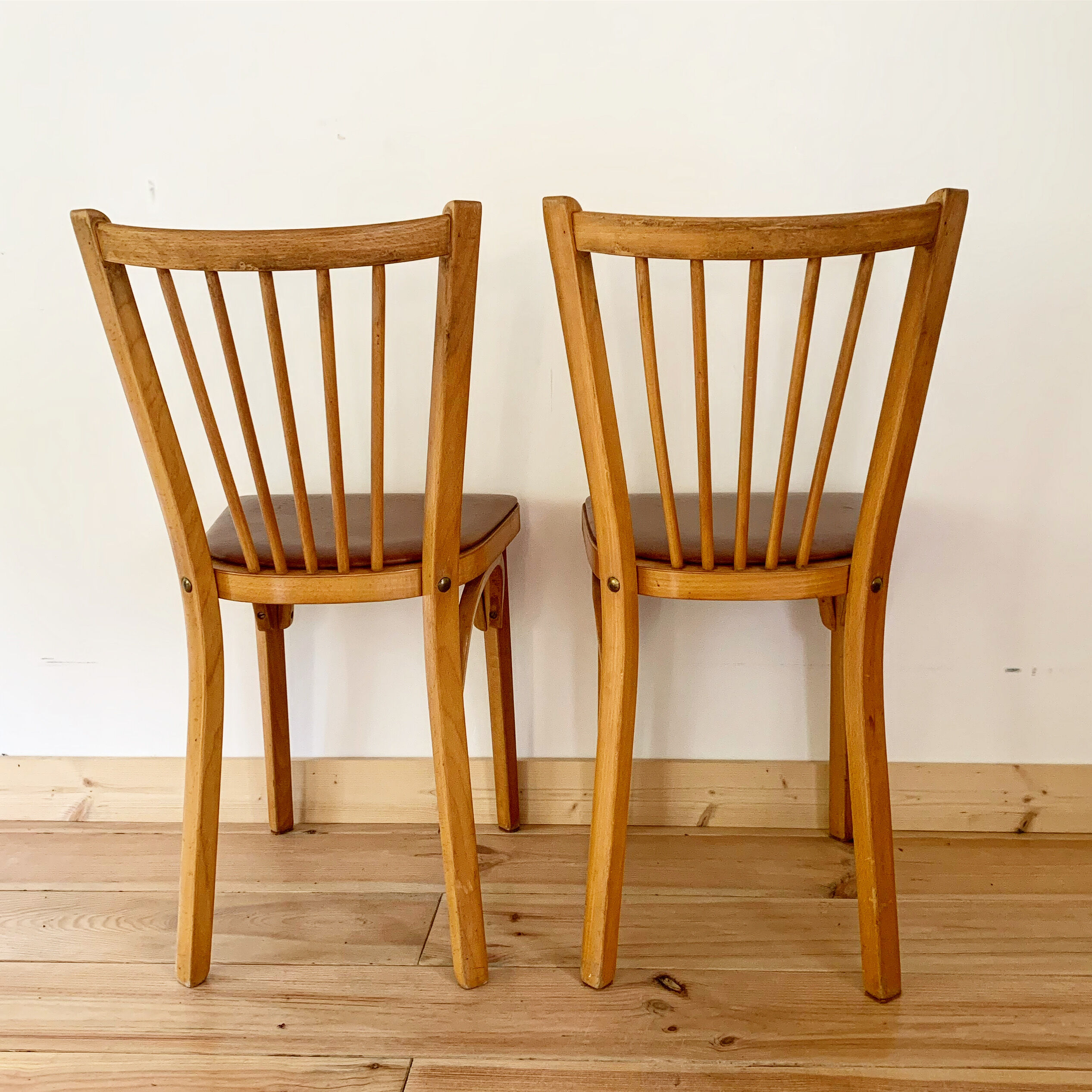 Pair of Baumann bistro chairs