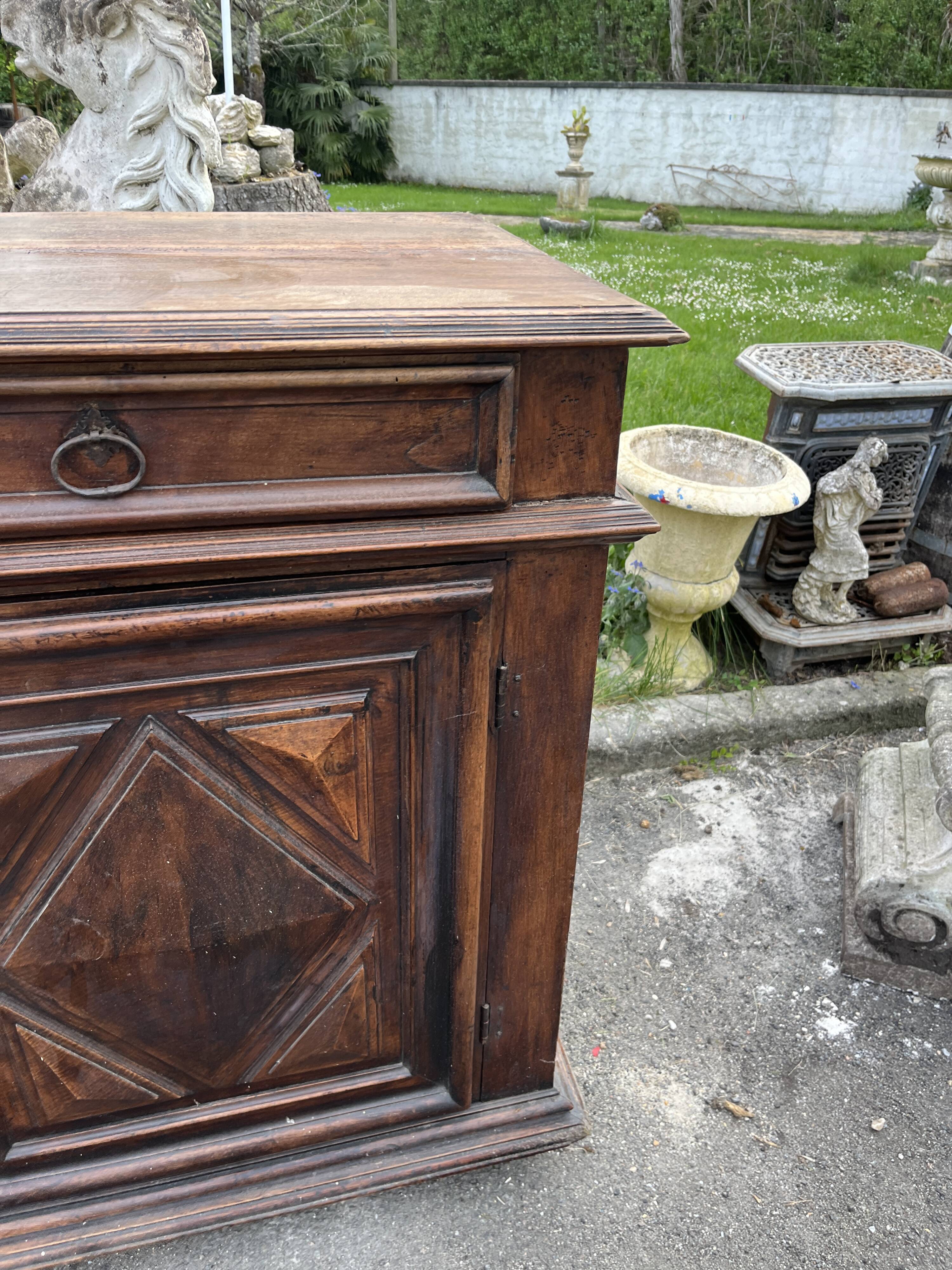 Antique walnut confiturier in Louis XIII style with diamond point panel.