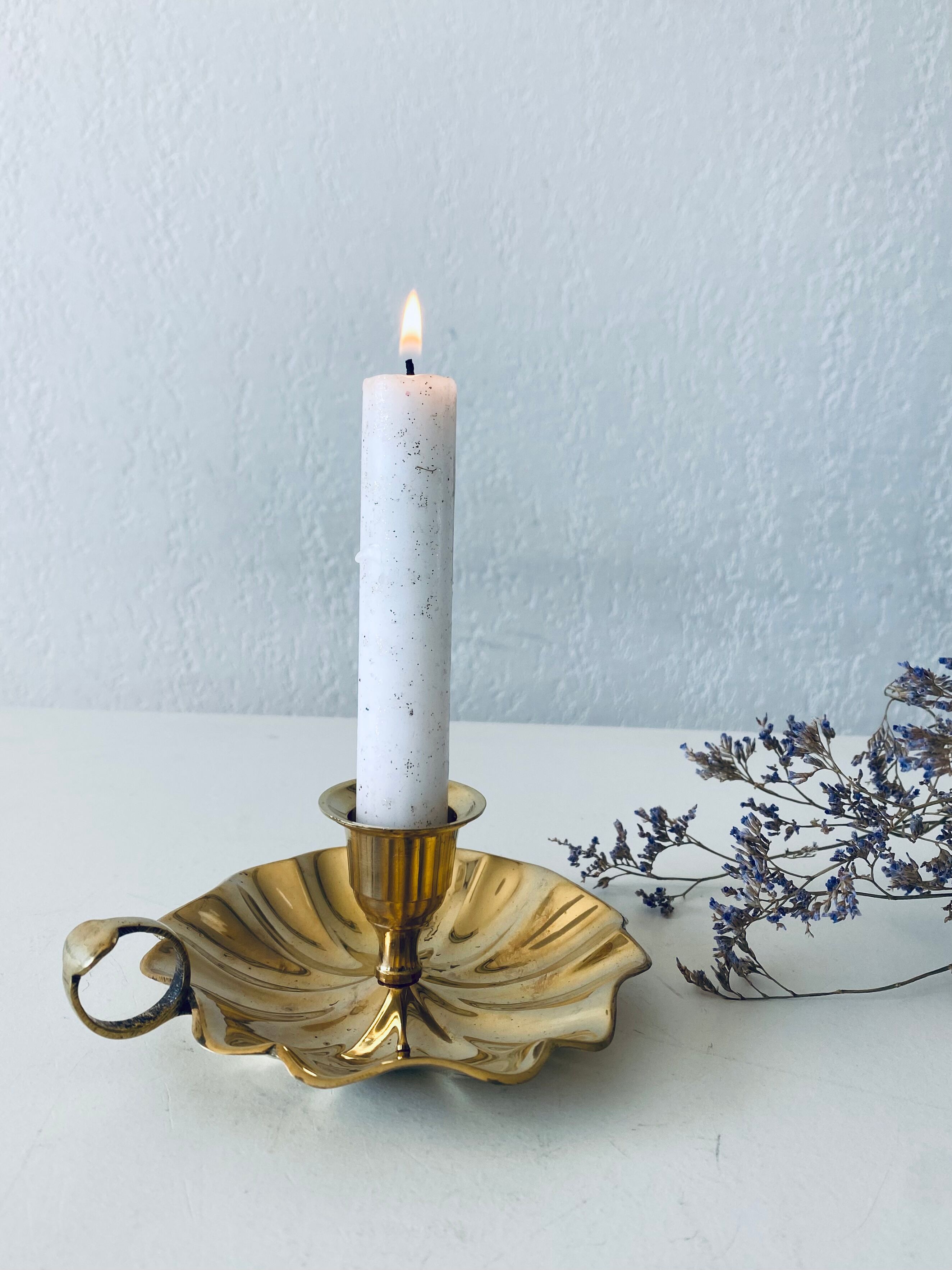 Indian candle holder in golden brass