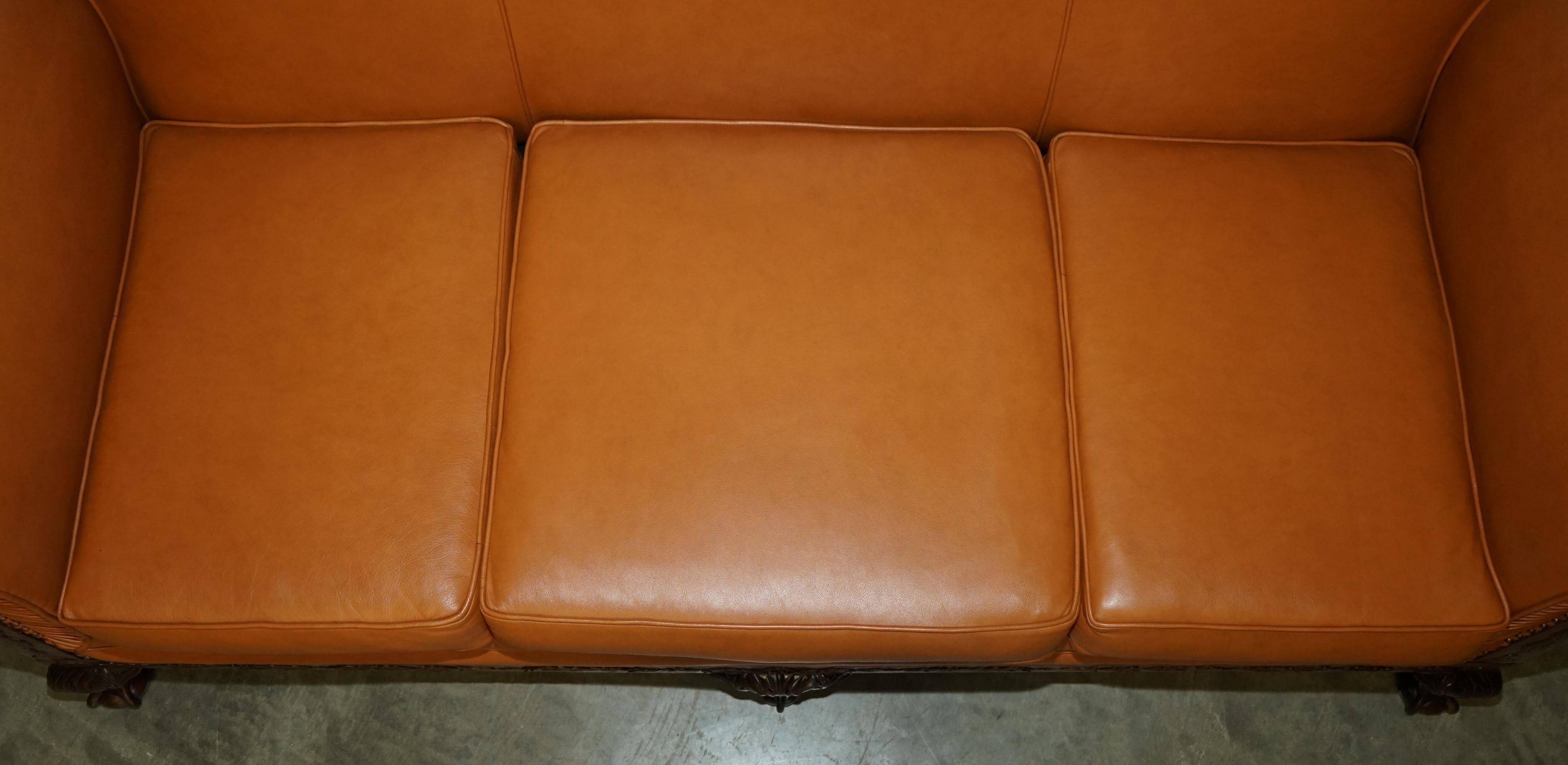 Restored three-seater leather canapé in late Victorian style.