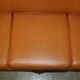 Restored three-seater leather canapé in late Victorian style.