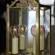 Antique glass wall light in brass
