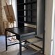 Postal sorting desk with a sliding top part back and forth.