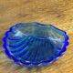 Shell-shaped butter dish in stainless steel and blue glass