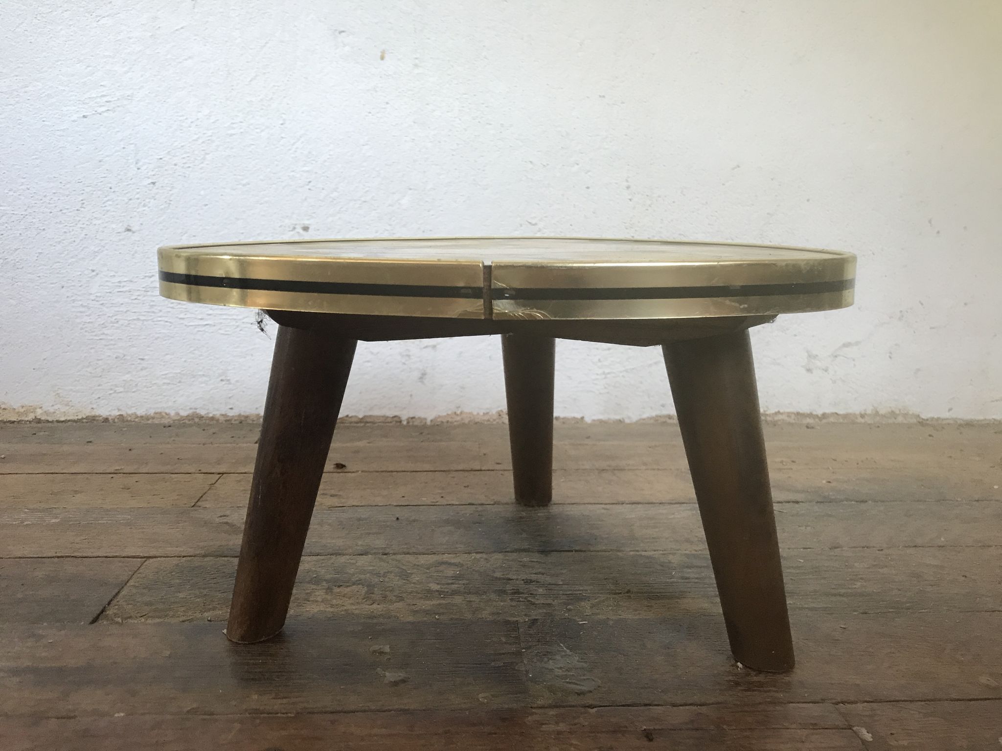 Small triangular table coffee table with a vintage tripod door midcentury plant 1950