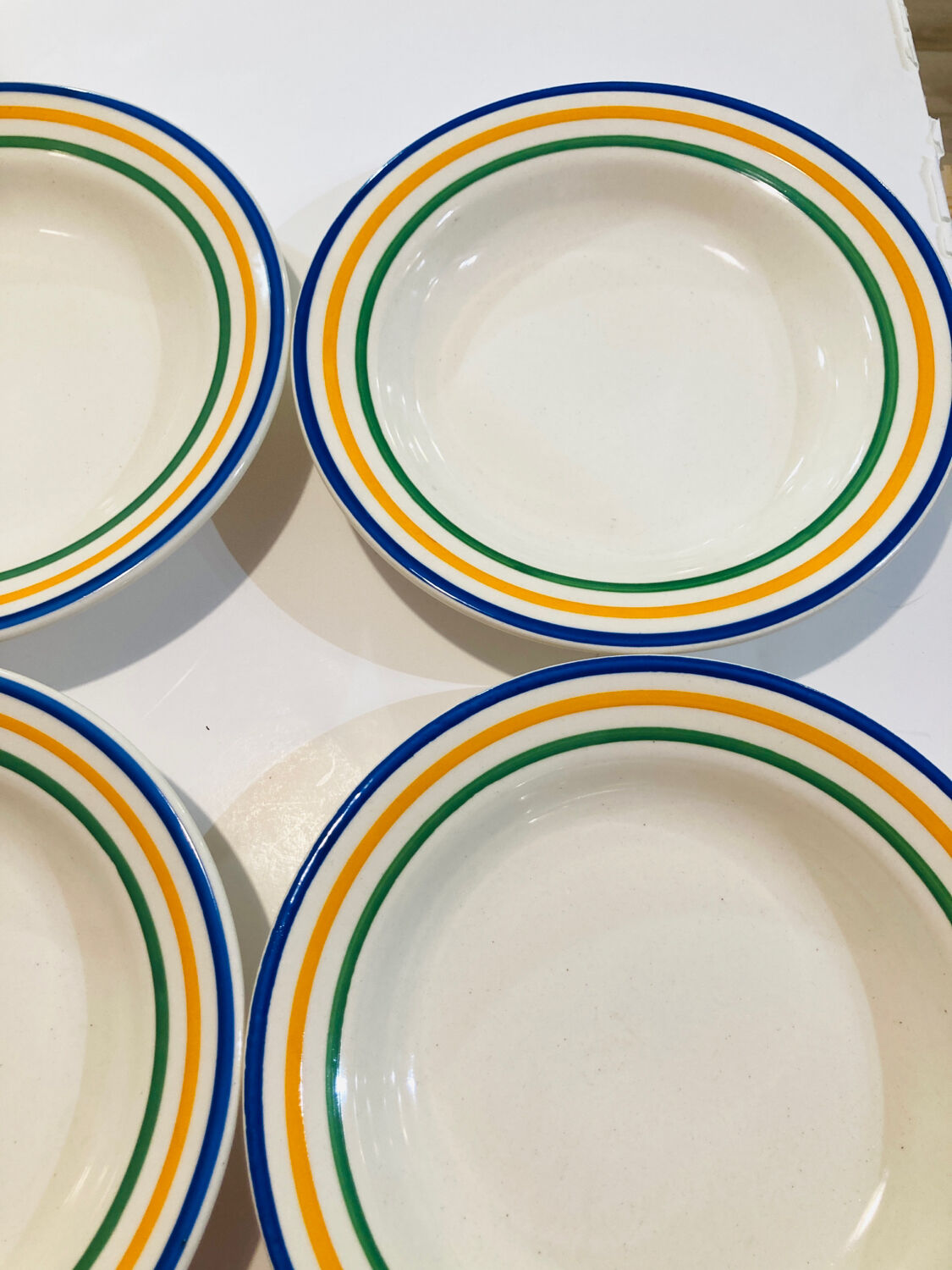 4 hollow faience plates with stripes made in Romania