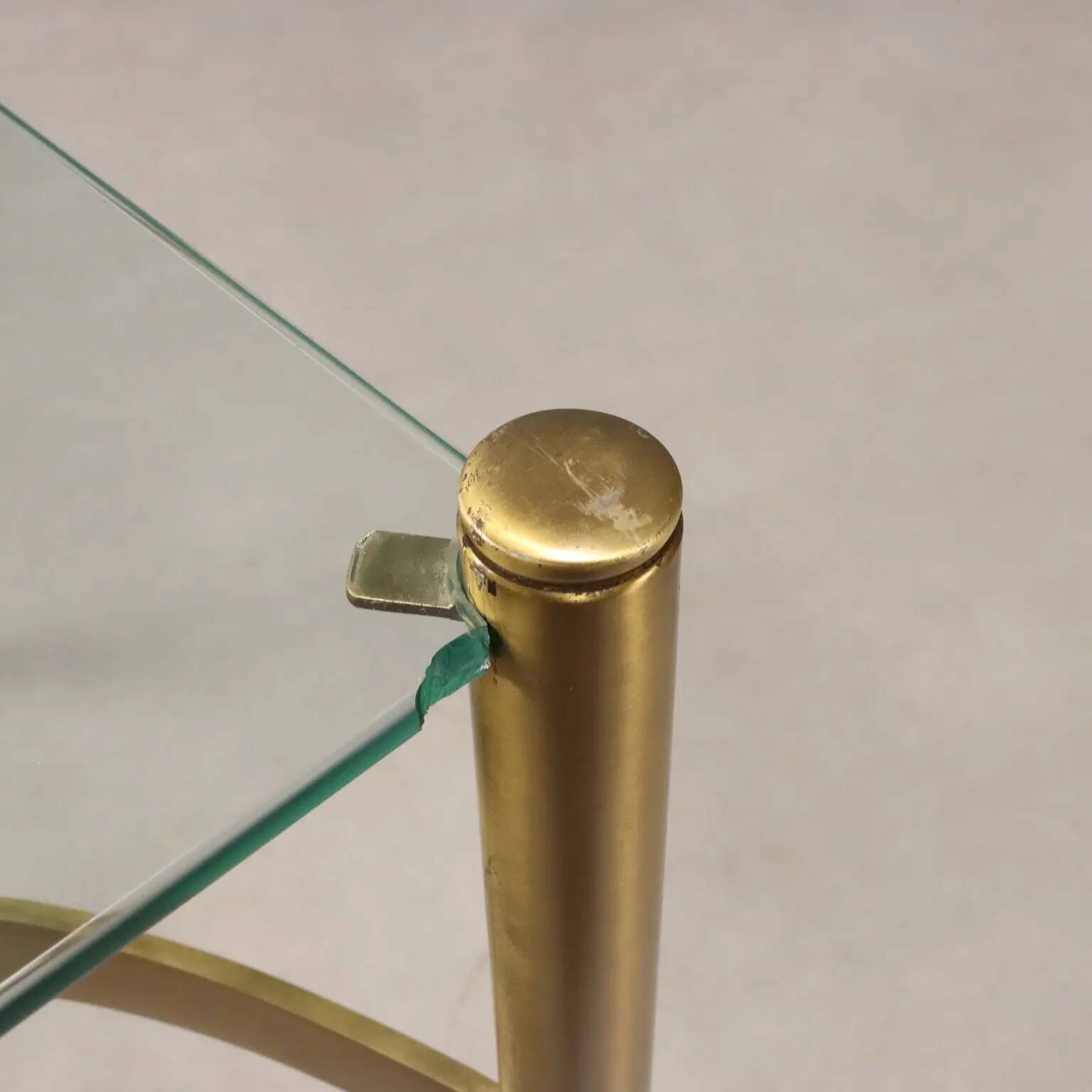 Vintage brass coffee table with glass top, Italian design from the 1970s.