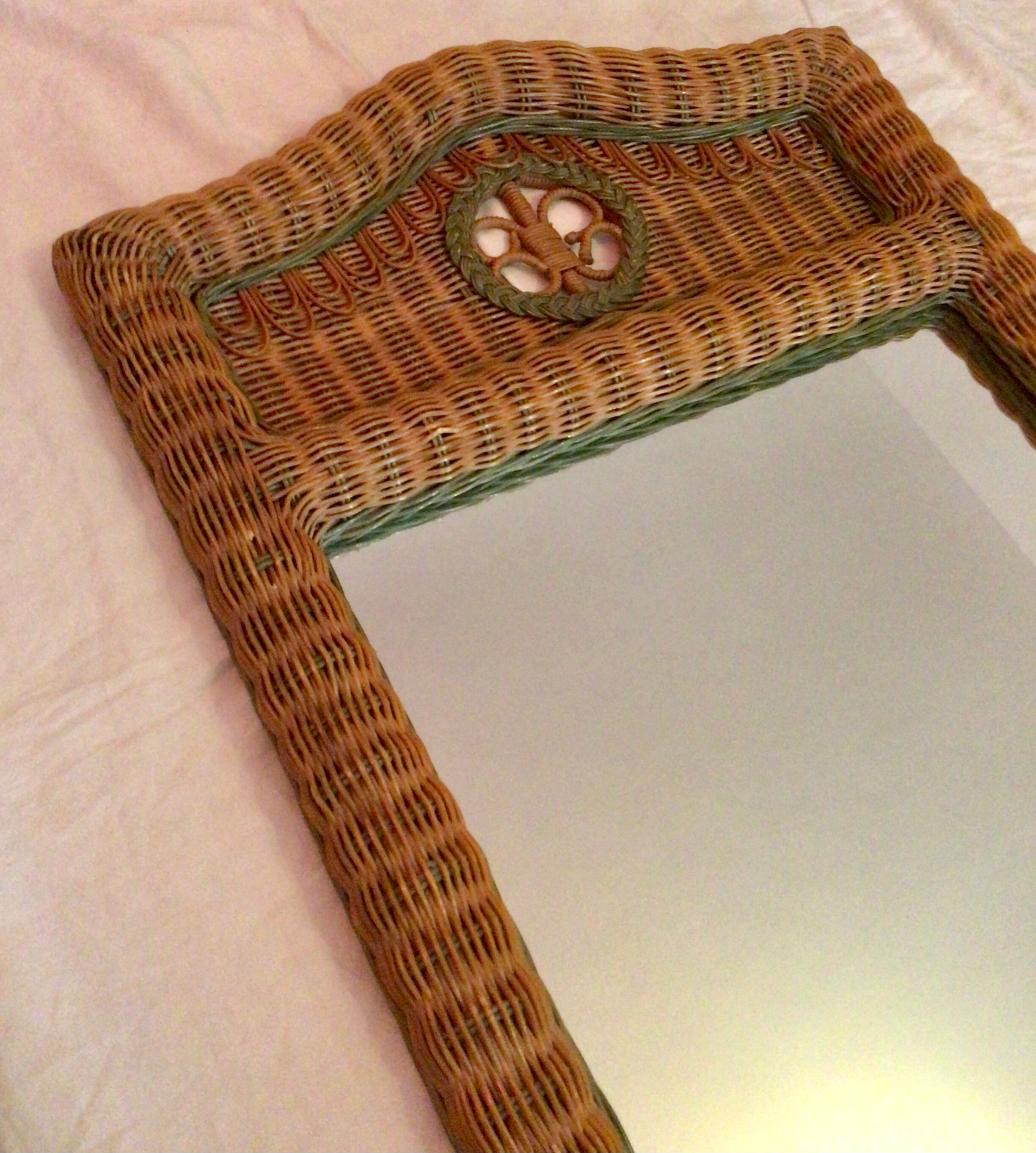 Vintage braided rattan mirror.