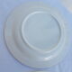 Set of 4 white and blue dinner plates.